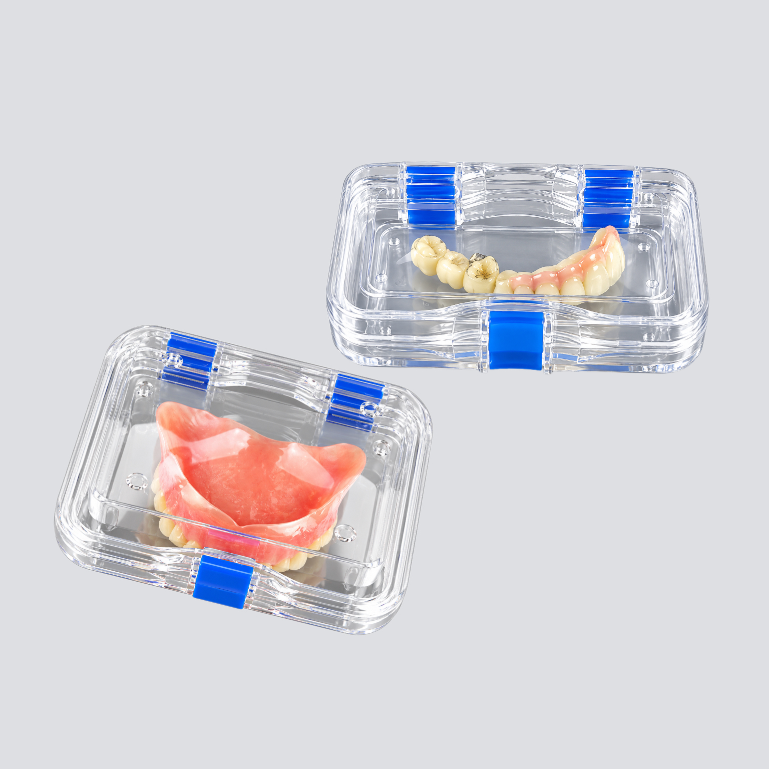 Clear appliance care boxes holding denture and hybrid restorations